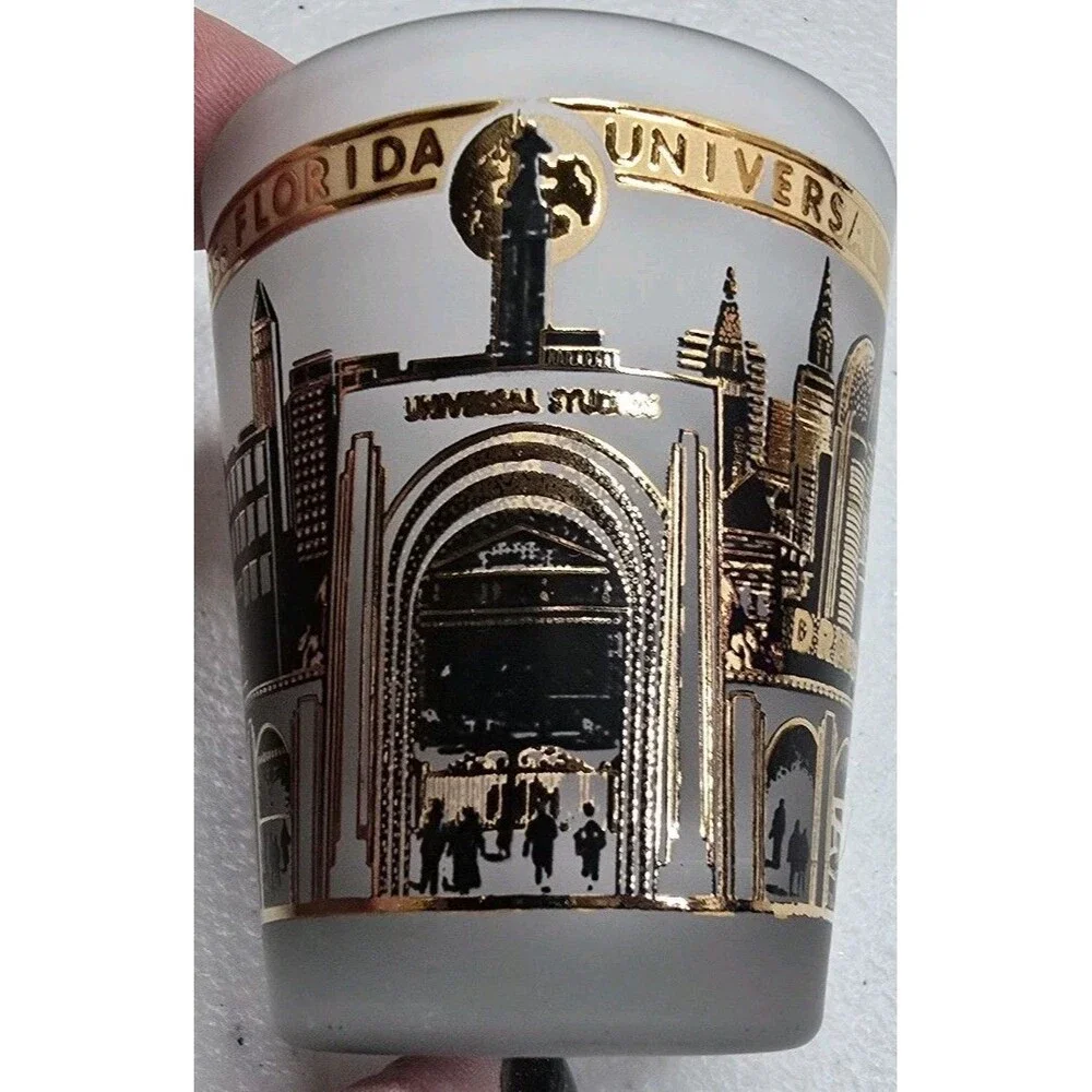 Vintage Universal Studio Florida Shot Glass Frosted With Black And Gold Trim